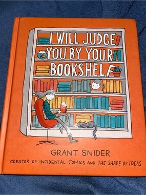 "I Will Judge You By Your Bookshelf" Orange Hardcover Graphic Novel Full Color